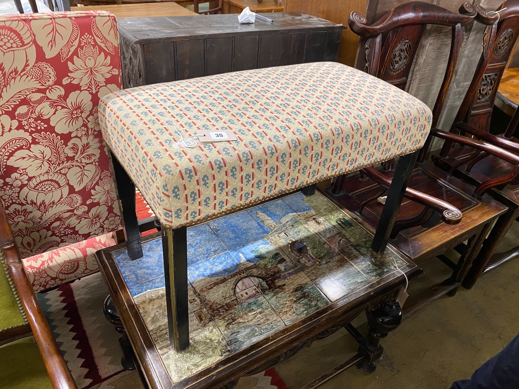 A George III style rectangular upholstered ebonised dressing stool, length 71cm, depth 40cm, height 50cm